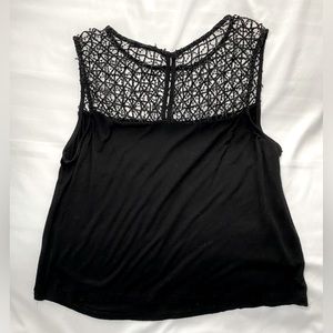 Black tank top. Buckle brand. Size L.